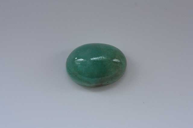 Emerald (Beryl) - Oval cabochon - 6.905 ct